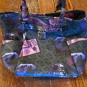 Kathy Van Zeeland bag purse purple. Safari / travel decorated and gently used!